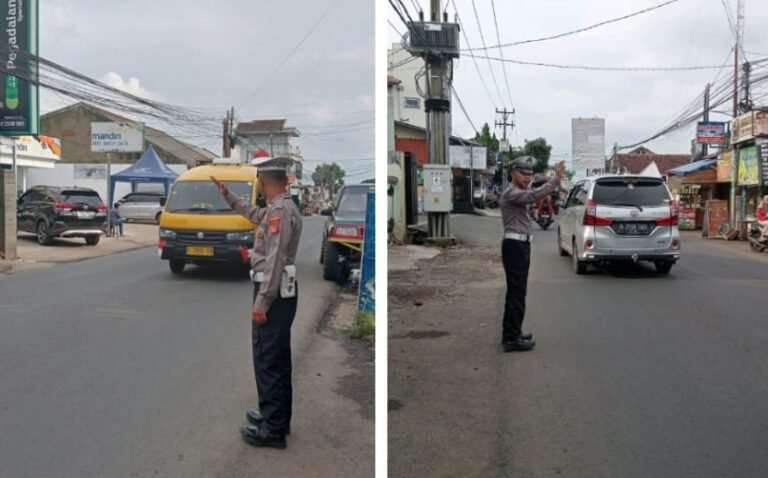 Personil Polsek Samarang Lakukan Giat Pengaturan Lalu Lintas Sore Hari.