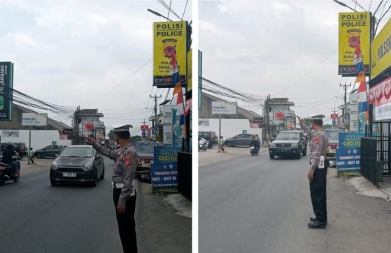 Dua Personil Polsek Samarang, Gencar Lakukan Pengaturan Lalulintas Sore Hari.